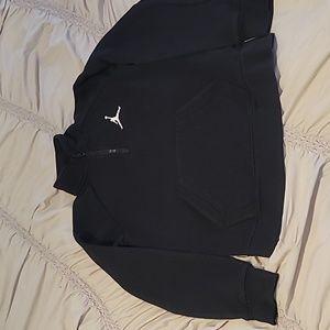 Boys Medium black Jordan half zip sweet shirt with front pocket.